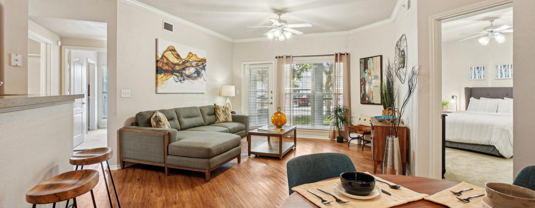 a living room with a wood floor