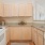 a kitchen with white cabinets