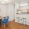 a kitchen with a table and chairs