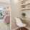 a bedroom with a bed and a chair