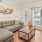 a living room with a couch and a table